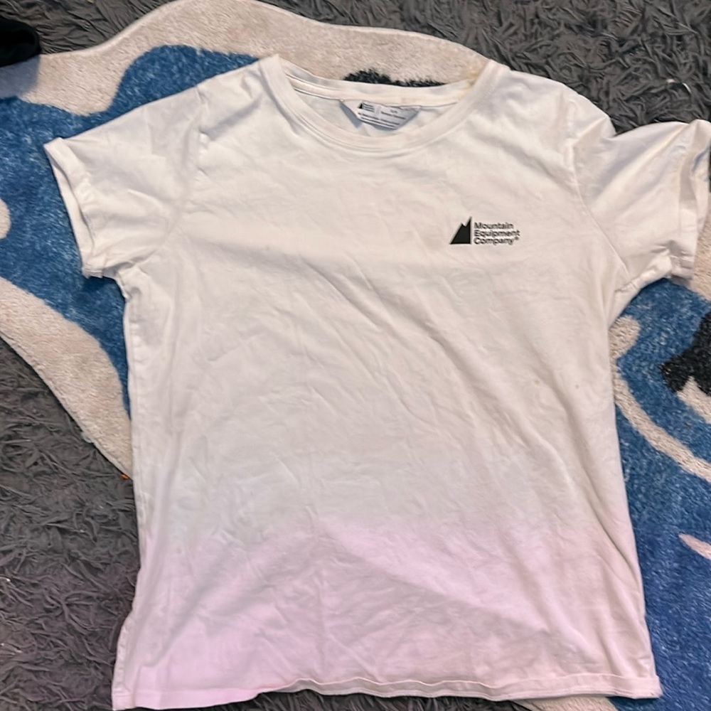 White mountain equipment company shirt has one very small stain and is a small